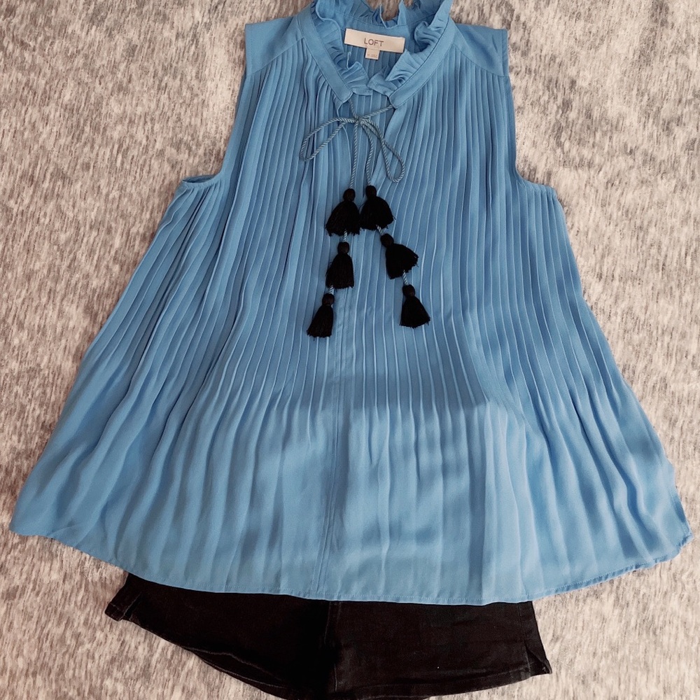Loft blue top with cute tassel details. Size XS but can also fit S!
